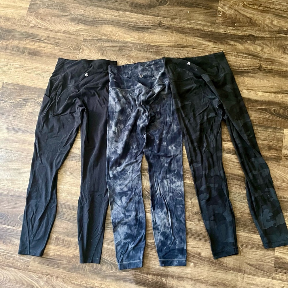Three pairs of Lululemon leggings